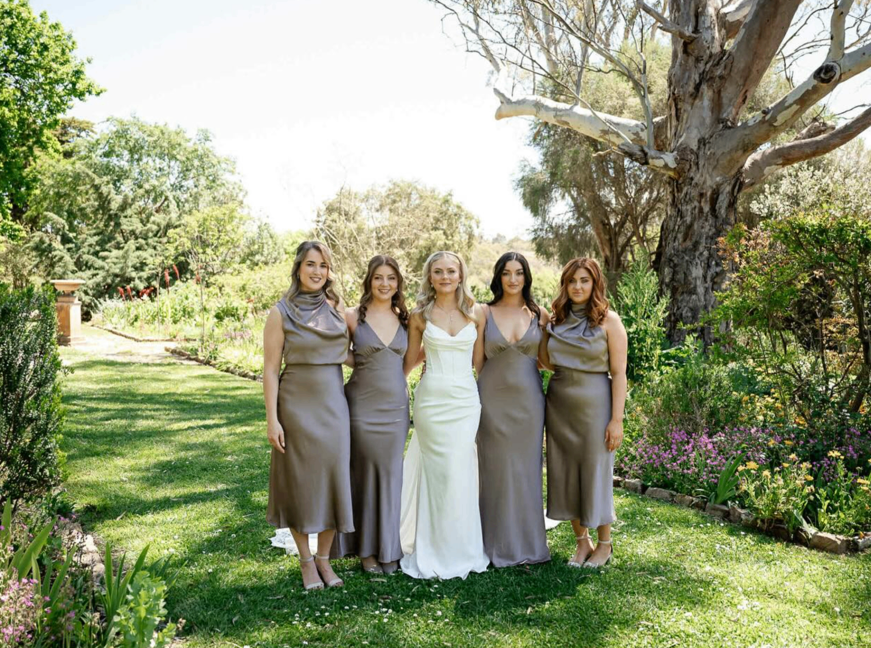 Bride and bridal party with naturally bronzed skin
